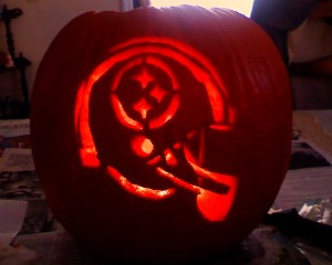 Steelers helmet with logo carved into my pumpkin at my grandparents house for 2010 halloween